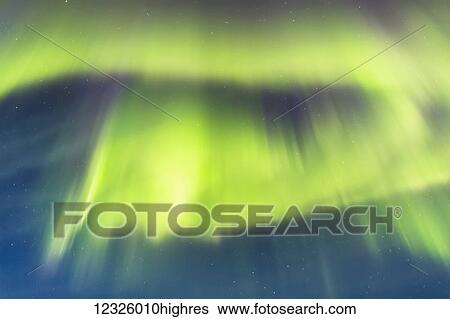 Bright green and purple Aurora Borealis dances over Upper Trail Lake, Moose Pass, Kenai Peninsula, South-central Alaska; Alaska, United States of America View Large Photo Image Stock Photograph - Bright green and purple Aurora Borealis dances over Upper Trail Lake, Moose Pass, Kenai Peninsula, South-central Alaska; Alaska, United States of America. Fotosearch