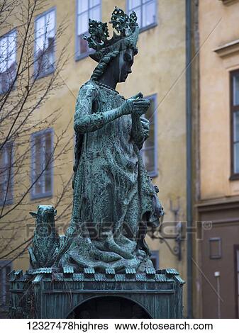 Stock Photograph - Bronze statue of a queen; Stockholm, Sweden. Fotosearch