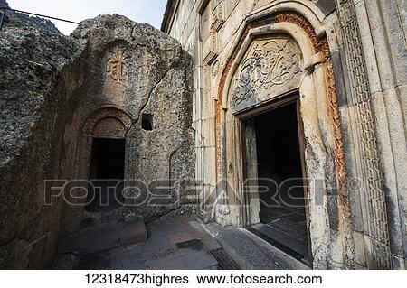 Cave and Western entrance of the Church of the Holy Mother of God at Geghard Monastery, Azat Valley; Kotayk, Armenia View Large Photo Image Stock Photograph - Cave and Western entrance of the Church of the Holy Mother of God at Geghard Monastery, Azat Valley; Kotayk, Armenia. Fotosearch