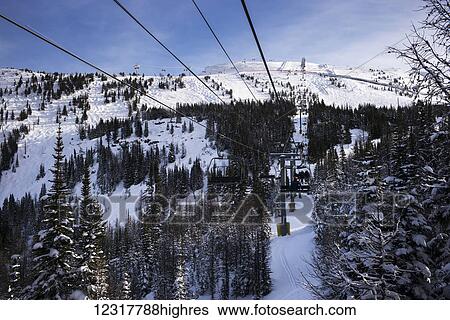 Chair lift at Sunshine Village ski resort, Banff National Park; Banff, Alberta, Canada View Large Photo Image Stock Photograph - Chair lift at Sunshine Village ski resort, Banff National Park; Banff, Alberta, Canada. Fotosearch
