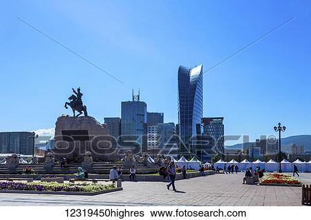 Chinggis Khaan Square, in the centre of Ulaanbaatar, is an area well used by residents and visitors alike. A statue to the hero Damdin Sukhbaatar stands in the centre, and market tents are set up daily; Ulaanbaatar, Mongolia View Large Photo Image Stock Photograph - Chinggis Khaan Square, in the centre of Ulaanbaatar, is an area well used by residents and visitors alike. A statue to the hero Damdin Sukhbaatar stands in the centre, and market tents are set up daily; Ulaanbaatar, Mongolia. Fotosearch