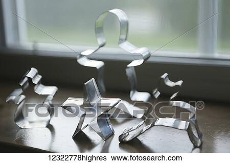 Christmas cookie cutters sitting on display on a window ledge View Large Photo Image Stock Photograph - Christmas cookie cutters sitting on display on a window ledge. Fotosearch