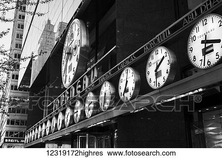 Clocks in a row showing times around the world, East 57th Street; New York City, New York, United States of America View Large Photo Image Stock Photograph - Clocks in a row showing times around the world, East 57th Street; New York City, New York, United States of America. Fotosearch
