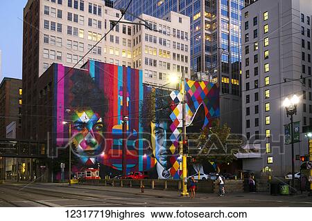 Stock Photograph - Colourful murals painted on the buildings; Minneapolis, Minnesota, United States of America. Fotosearch