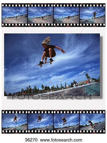 Concept image of boarder getting big air in park View Large Photo Image Stock Image - Concept image of boarder getting big air in park. Fotosearch