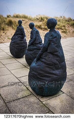 Stock Photograph - Conversation Piece by Juan Mu0z; South Shields, Tyne and Wear, England. Fotosearch