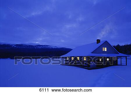 Cottage in heavy snowfall by lake View Large Photo Image Stock Image - Cottage in heavy snowfall by lake. Fotosearch