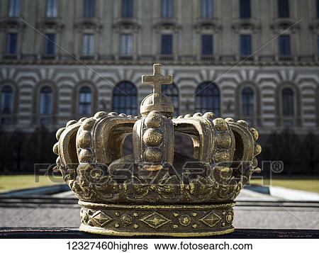 Stock Photograph - Crown ornament on top of the gate of the eastern facade of the Royal Palace; Stockholm, Sweden. Fotosearch