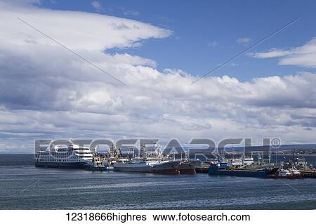 Cruise ship and crab boats at pier in Punta Arenas; Punta Arenas, Magallanes and Antartica Chilena, Chile View Large Photo Image Stock Photograph - Cruise ship and crab boats at pier in Punta Arenas; Punta Arenas, Magallanes and Antartica Chilena, Chile. Fotosearch