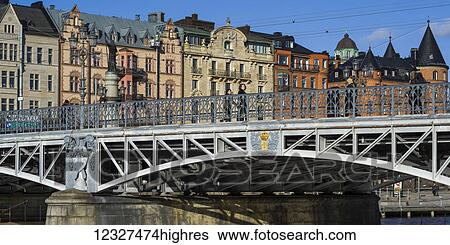 Djurgarden Bridge at the island of Djurgarden; Stockholm, Sweden View Large Photo Image Stock Photograph - Djurgarden Bridge at the island of Djurgarden; Stockholm, Sweden. Fotosearch