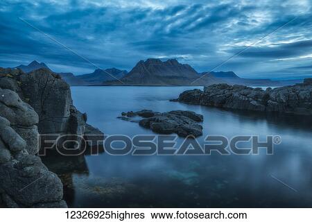Dusk over the Strandir Coast; West Fjords, Iceland View Large Photo Image Stock Photograph - Dusk over the Strandir Coast; West Fjords, Iceland. Fotosearch