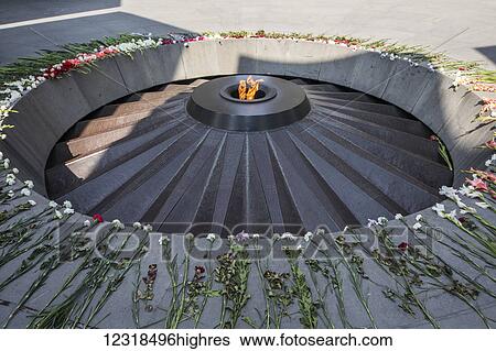 Stock Photograph - Eternal flame dedicated to the 1. 5 million people killed during the Armenian Ge0cide in the Armenian Ge0cide memorial complex on Tsitsernakaberd hill; Yerevan, Armenia. Fotosearch
