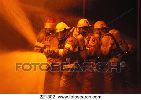 Firemen fighting fire View Large Photo Image Stock Image - Firemen fighting fire. Fotosearch