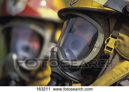Firemen wearing masks View Large Photo Image Stock Image - Firemen wearing masks. Fotosearch