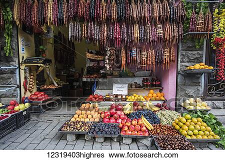 Fruit store offering Churchkhela, traditional Georgian candies made from nuts, almonds, walnuts and hazelnuts threaded onto a string, dipped in thickened grape juice or fruit juices and dried; Tbilisi, Georgia View Large Photo Image Stock Photograph - Fruit store offering Churchkhela, traditional Georgian candies made from nuts, almonds, walnuts and hazelnuts threaded onto a string, dipped in thickened grape juice or fruit juices and dried; Tbilisi, Georgia. Fotosearch