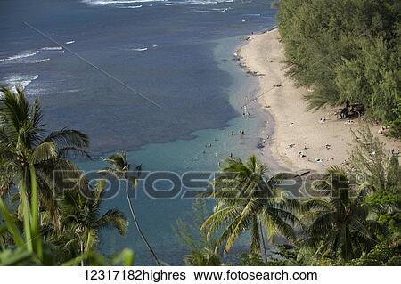 Stock Photograph - Haena Beach State Park and Ke'e Beach from the Kalalau Trail, Na Pali Coast; Kauai, Hawaii, United States of America. Fotosearch