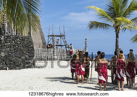 Stock Photograph - Hawaiians offer gifts at heiau in Pu'uhonua O Honaunau National Park; Honaunau, Island of Hawaii, Hawaii, United States of America. Fotosearch