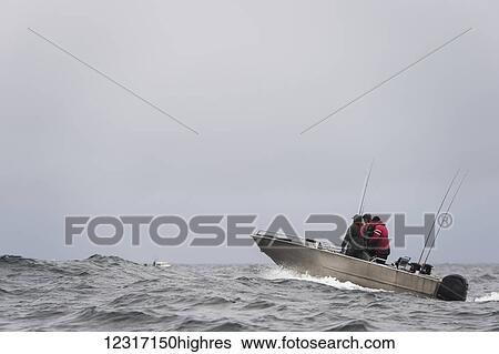 Stock Photograph - Heading out in rough water to fish from a fishing boat off the Queen Charlotte Islands; British Columbia, Canada. Fotosearch