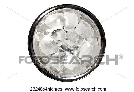 Stock Photograph - High angle view of ice cubes in a metal pail on a white background; Ontario, Canada. Fotosearch