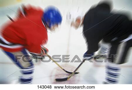 Stock Photo - Hockey face-off. Fotosearch