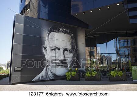 Stock Photograph - Image of Sir Tyrone Guthrie on the facade of Guthrie Theater; Minneapolis, Minnesota, United States of America. Fotosearch