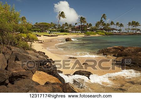 Stock Photograph - Kukui'ula Beach, pier and bay, small boat landing, near Poipu; Kauai, Hawaii, United States of Ameria. Fotosearch