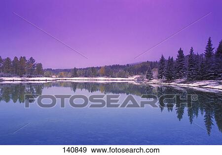 Stock Photo - Lake in winter with snow on edge. Fotosearch