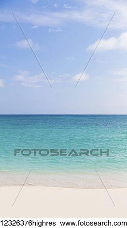 Landscape of a white sandy beach and turquoise ocean and blue sky, Lanikai Beach; Honolulu, Oahu, Hawaii, United States of America View Large Photo Image Stock Photograph - Landscape of a white sandy beach and turquoise ocean and blue sky, Lanikai Beach; Honolulu, Oahu, Hawaii, United States of America. Fotosearch