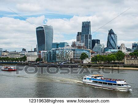 Looking across the River Thames to the City of London (The Walkie Talkie building and The Gherkin, centre); London, England View Large Photo Image Stock Photograph - Looking across the River Thames to the City of London (The Walkie Talkie building and The Gherkin, centre); London, England. Fotosearch