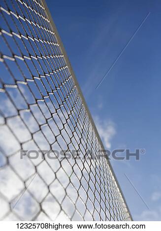 Low angle view of a volleyball net against a blue sky with cloud; Honolulu, Oahu, Hawaii, United States of America View Large Photo Image Stock Photograph - Low angle view of a volleyball net against a blue sky with cloud; Honolulu, Oahu, Hawaii, United States of America. Fotosearch