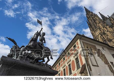 Low angle view of St. Vitus Cathedral, Prague Castle and a statue of a rider on a horse; Prague, Czechia View Large Photo Image Stock Photograph - Low angle view of St. Vitus Cathedral, Prague Castle and a statue of a rider on a horse; Prague, Czechia. Fotosearch