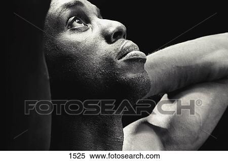 Stock Photography - Man looking up. Fotosearch