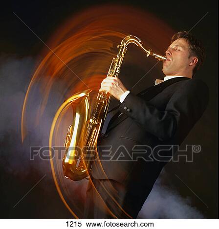 Stock Photography - Man playing saxophone. Fotosearch
