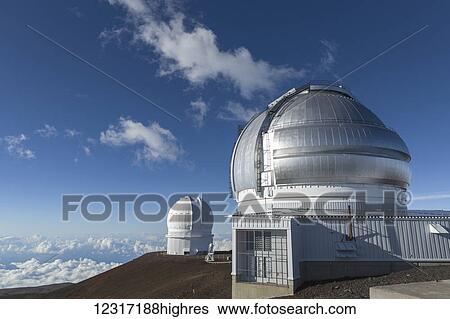 Stock Photograph - Mauna Kea summit in Hawaii showing CFHT (distant) and Gemini Observatories; Island of Hawaii, Hawaii, United States of America. Fotosearch