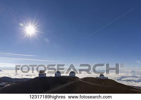 Stock Photograph - Mauna Kea summit in Hawaii showing Suburu and Twin Kecks 0bervatories; Island of Hawaii, Hawaii, United States of America. Fotosearch