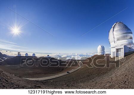 Stock Photograph - Mauna Kea summit in Hawaii showing Suburu, Twin Kecks, CFHT and Gemini 0bservatories; Island of Hawaii, Hawaii, United States of America. Fotosearch