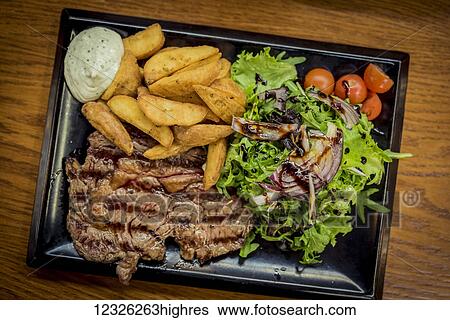 Meal at Campo de Ourique urban food market; Lisbon, Portugal View Large Photo Image Stock Photograph - Meal at Campo de Ourique urban food market; Lisbon, Portugal. Fotosearch