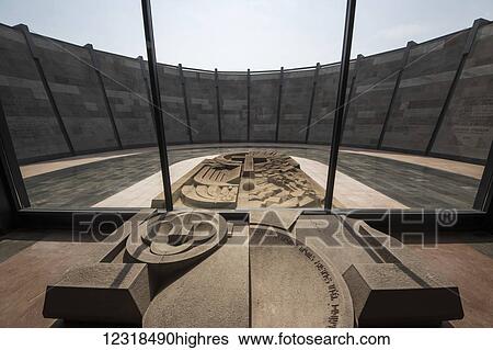 Stock Photograph - Memorial stone sculpture in the Armenian Ge0cide Museum-Institute at the Armenian Ge0cide memorial complex on Tsitsernakaberd hill; Yerevan, Armenia. Fotosearch