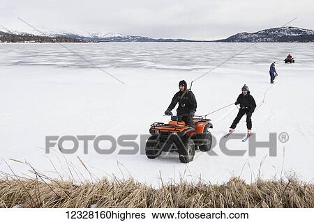 Men on a freshwater harbor seal hunt in winter, Lake Iliamna, Pedro Bay, Southcentral Alaska, USA View Large Photo Image Stock Photograph - Men on a freshwater harbor seal hunt in winter, Lake Iliamna, Pedro Bay, Southcentral Alaska, USA. Fotosearch