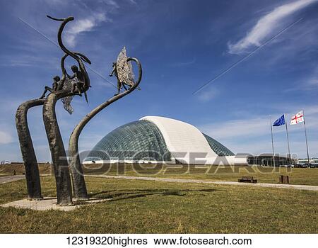 Stock Photograph - Modern sculptures in front of the Georgian Parliament building; Kutaisi, Imereti, Georgia. Fotosearch