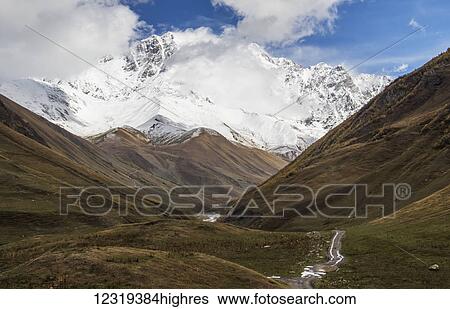 Stock Photograph - Mount Shkhara in the Greater Caucasus Range; Ushguli, Samegrelo-Zemo Svaneti, Georgia. Fotosearch