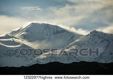 Mountain in the Andes covered with a layer of fresh snow; Mendoza, Argentina View Large Photo Image Stock Photograph - Mountain in the Andes covered with a layer of fresh snow; Mendoza, Argentina. Fotosearch