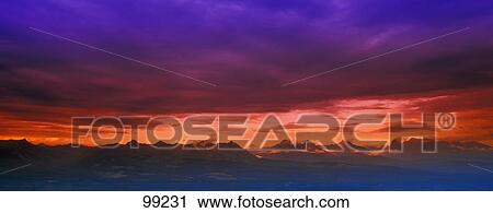Mountain range at sunset View Large Photo Image Stock Image - Mountain range at sunset. Fotosearch