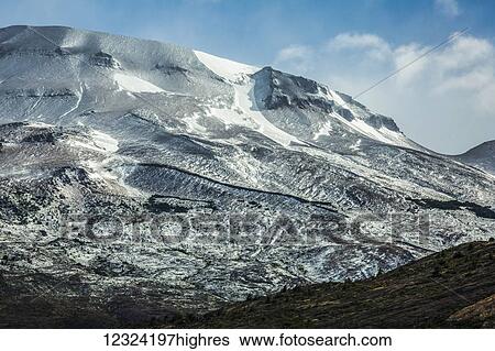 Stock Photograph - Mountains along Argentino Lake near El Calafate; Santa Cruz Province, Argentina. Fotosearch