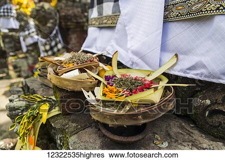 Offering at a traditional Hindu temple; Bali Island, Indonesia View Large Photo Image Stock Photograph - Offering at a traditional Hindu temple; Bali Island, Indonesia. Fotosearch