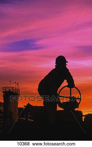 Oil and gas employee View Large Photo Image Stock Photo - Oil and gas employee. Fotosearch
