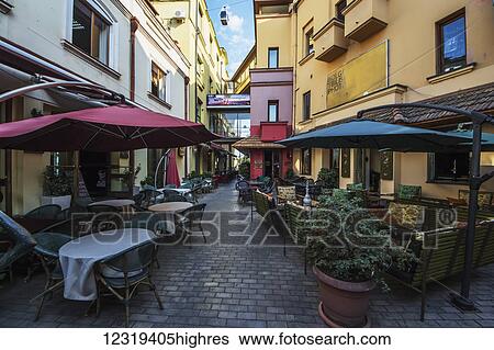 Stock Photograph - Open air restaurants on a street; Tbilisi, Georgia. Fotosearch