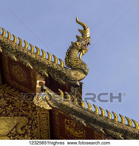 Ornate, decorative roofline of a building; Tambon Mae Chan, Chang Wat Chiang Rai, Thailand View Large Photo Image Stock Photograph - Ornate, decorative roofline of a building; Tambon Mae Chan, Chang Wat Chiang Rai, Thailand. Fotosearch