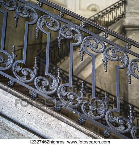 Stock Photograph - Ornate metal railing along stairs; Stockholm, Sweden. Fotosearch