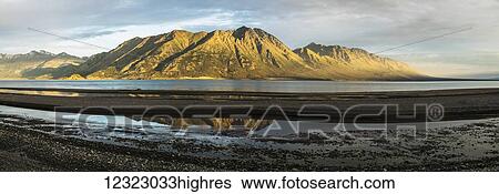 Stock Photograph - Panoramic view of Sheep Mountain and Kluane Lake; Yukon, Canada. Fotosearch
